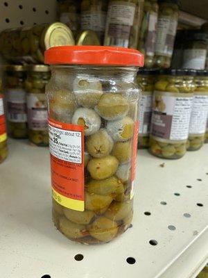 Rotten moldy green olives