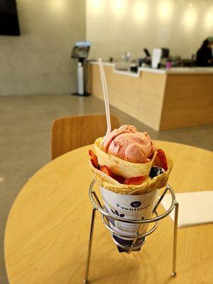 Mixed berries with strawberry gelato on top. (Dine in)