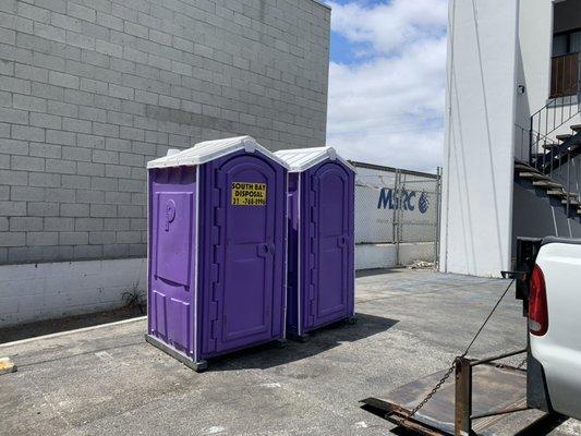 Set of two portable toilets