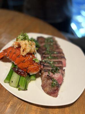 New York strip with lobster tail and asparagus