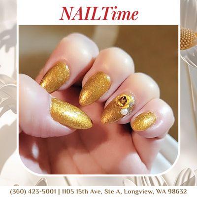 Gold glitter nails that light up the room--turn heads and catch every eye with your sparkling style