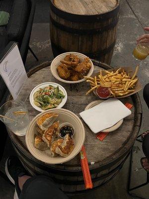 Cucumber salad, fried chicken, pork dumpling, fries