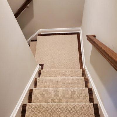 a runner with texture, design, all pet protection, durable carpet on the stairs. Korkmaz rugs and flooring  installed tuftex  carpet.