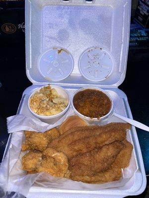 2 Fish & 5Shrimp dinner with Candied Yams and Macaroni & Cheese  their sides are delicious