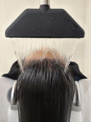 Stimulating waterfall rinse.