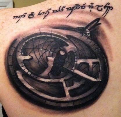 Astrolabe tattoo with Elvish script done by Mike.