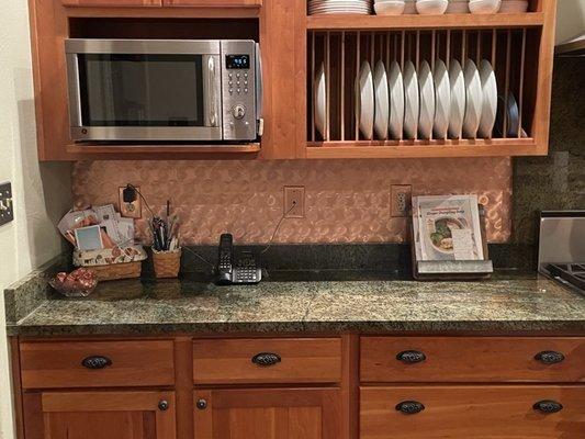 Copper backsplash and outlet covers