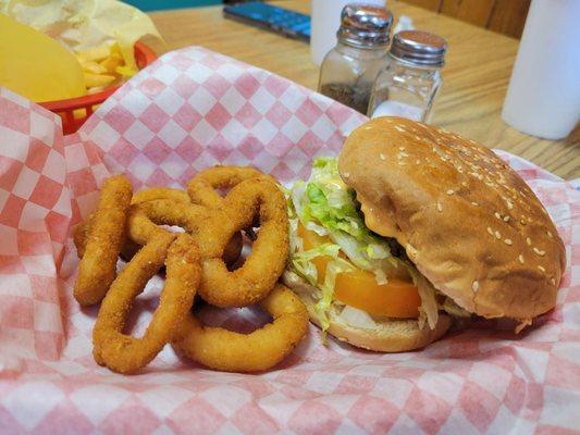 1/4 lb cheeseburger with onion rings