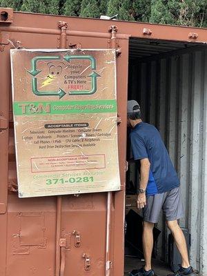 My husband stepping into the container