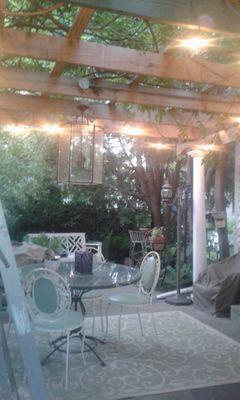 Enjoy our quoi pond under our Pergola on a quiet evening