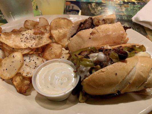 Philly cheesesteak and homemade chips. Pretty good sub. Chips were undercooked.