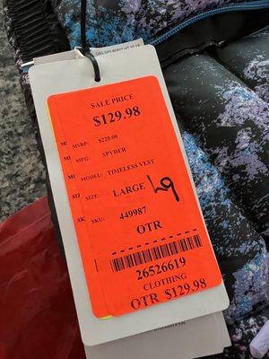 Price tag attached to vest $129.98