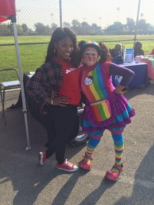 Tati's the clown and State Farm Agent Florence Harrison #MLKParade free face painting for the kids!!!