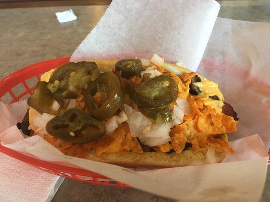 Custom hotdog with Doritos and jalapeños