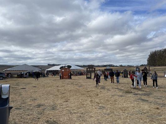 "Old west" town fronts and tents for precut pumpkins and for eating.