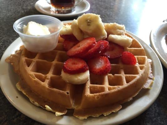 Belgian waffle with strawberries + bananas