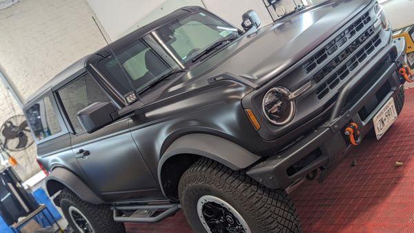 Ford Bronco wrapped in satin black vinyl