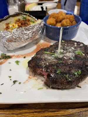 Chopped steak, loaded baked potato and fried okra