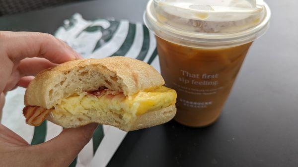 Bacon, Gouda & egg sandwich and grande iced coffee with milk