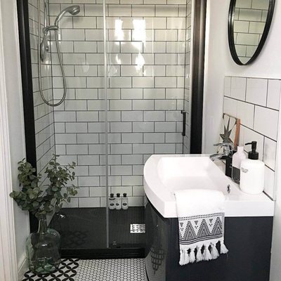 Two Bald Guys, LLC
 Black White Small Bathroom Remodel