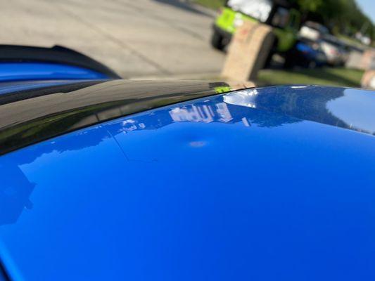 Repaired roof dent