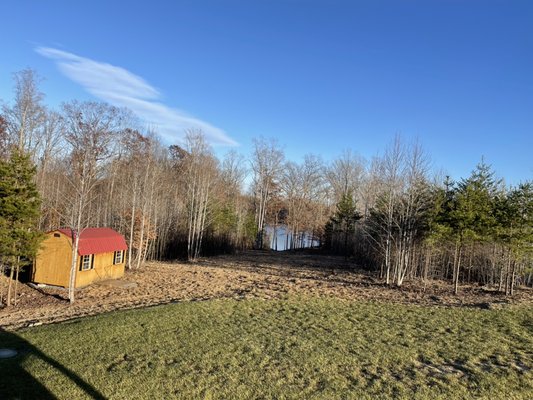 After land has been cleared, water now visible from back yard.