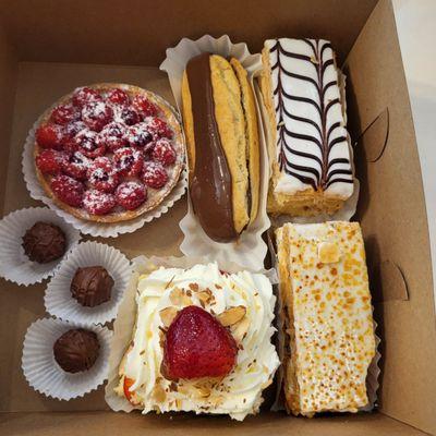 Fruit tart, éclair, napoleon, chantilly napoleon, shortcake and chocolates