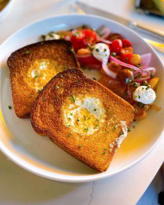 Egg in a hole - house-made brioche, smoked salmon, whipped crème fraiche, red onion, capers