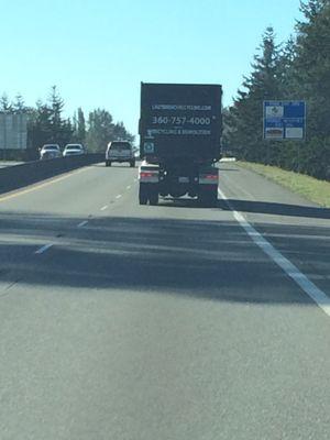 Following recycling truck after impact.