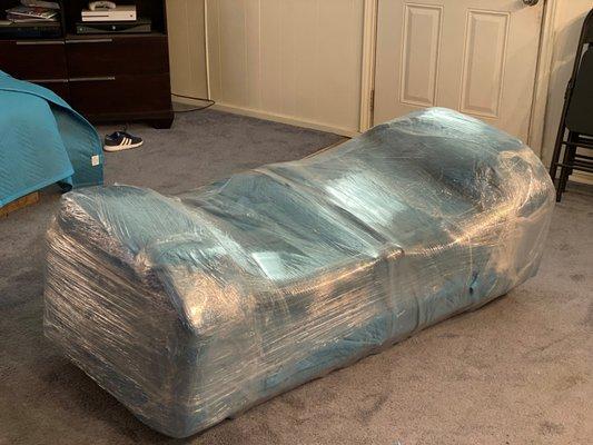 loveseat pad wrapped and shrink wrapped. Ready to load