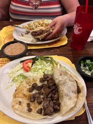 Carna Asada tacos and a beef burrito