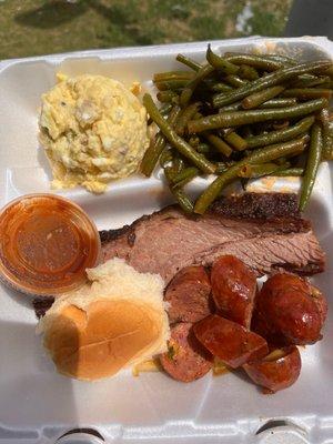 2 meats + 2 sides. Brisket and jalepeno cheddar sausage with green beans and potato salad