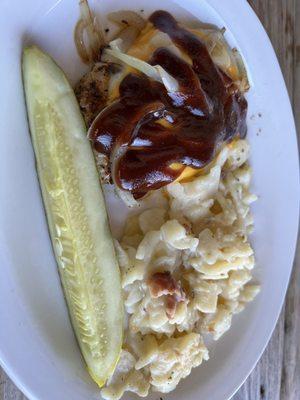 Breadless BBQ Grilled Chicken with American a cheese, grilled onions, and BBQ Sauce with a dill pickle and Scalloped potatoes.