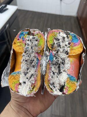 Oreo cookie cream cheese on rainbow bagel