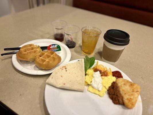 Continental breakfast? Great! Who can complain. I love a hot mini waffle station and their coffee self serve bar has Monin syrup. Love it!