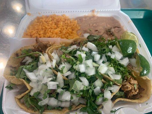 Three taco carnitas plate, includes rice and beans....yummy!