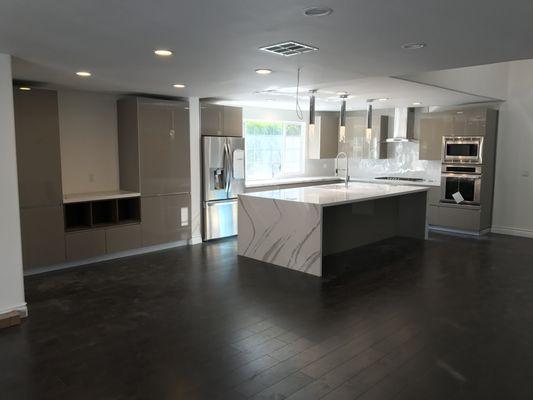 Complete kitchen remodel, including removing two support walls to create an open floor plan.