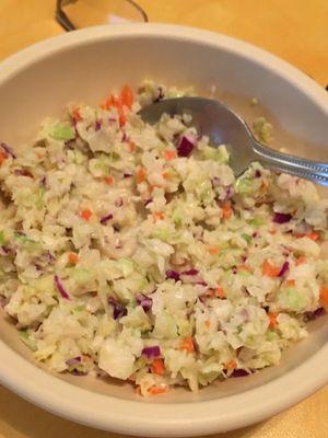 Generous portion of slaw and very tasty.