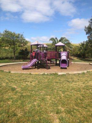 Playground area. Set far back from the road and parking.