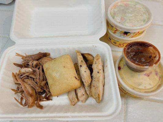 Takeout 2 meat plate chicken and pulled pork cold slaw and potato salad  thought there would be sauce on the meat.