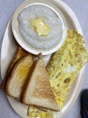 Ham and cheese omelette with grits and toast