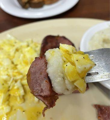 Sausage, eggs, and grits! The perfect bite!