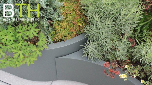 Landscape Design, Custom Planters, Installation and Horticultural Service