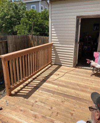 Can you spot the difference in wood quality? Deck = Foster lumber in Vallejo. Railing = Ashby lumber in Concord.