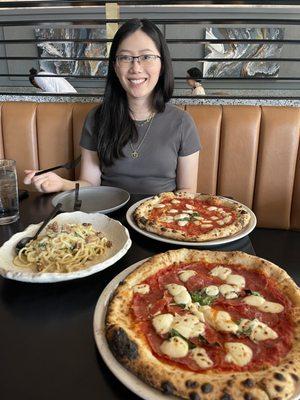 Bucatini alla Carbonara, Margherita Verace Pizza, and Diavola Pizza with basil instead of arugala.