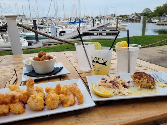 Dockside shrimp appetizer, hushpuppies, crab cake with coleslaw appetizer and a house margarita. Delicious!