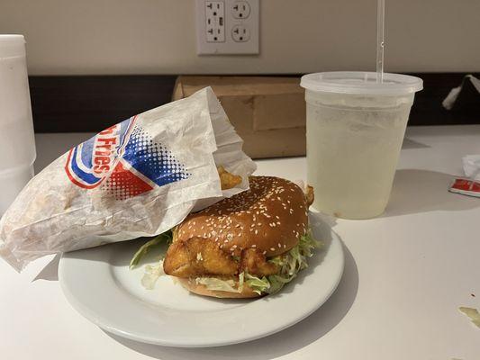 Fish sandwich with lemonade. Fries portions were huge!