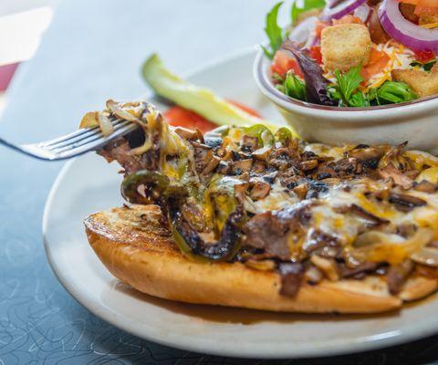 Philly Cheese Steak: Roast beef, grill onions, grill green peppers, mushrooms, and
cheddar jack cheese on a roll break.