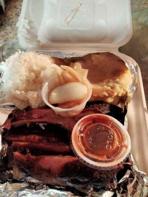 Ribs, mashed potatoes,sticky rice and onions.