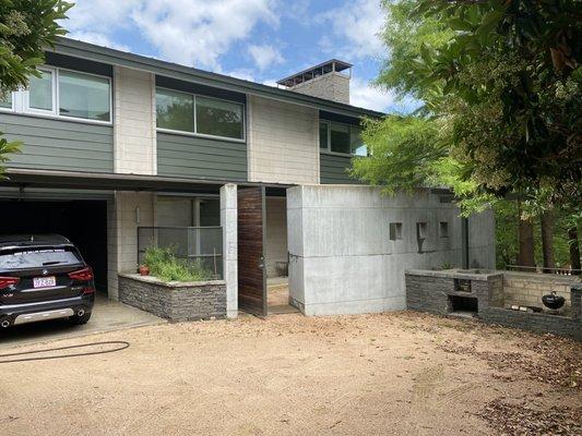 Exterior paint work on paneling completed by Elvis and crew.